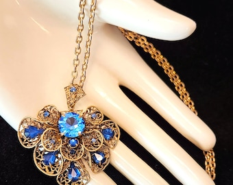 Vintage Signed CZECHOSLOVAKIA Filigree Pendant & Chain Necklace with Blue Rhinestones in a Goldtone Setting.