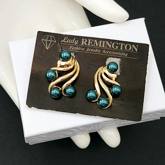 Vintage Lady REMINGTON 1980s Swirl Clip Earrings with… Gem