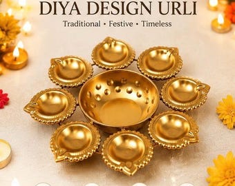 May include: An 8 inch gold-colored metal urli bowl featuring a central basin surrounded by seven attached diya lamp holders. The text 8 INCH DIYA DESIGN URLI is visible above the bowl, with additional text below the bowl and icons.