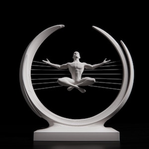 May include: A white sculpture of a person in a seated yoga pose, arms outstretched, within a circular frame. The figure is centered, with the frame's curved top and bottom sections. Thin, horizontal lines connect the frame's sides. The background is black.