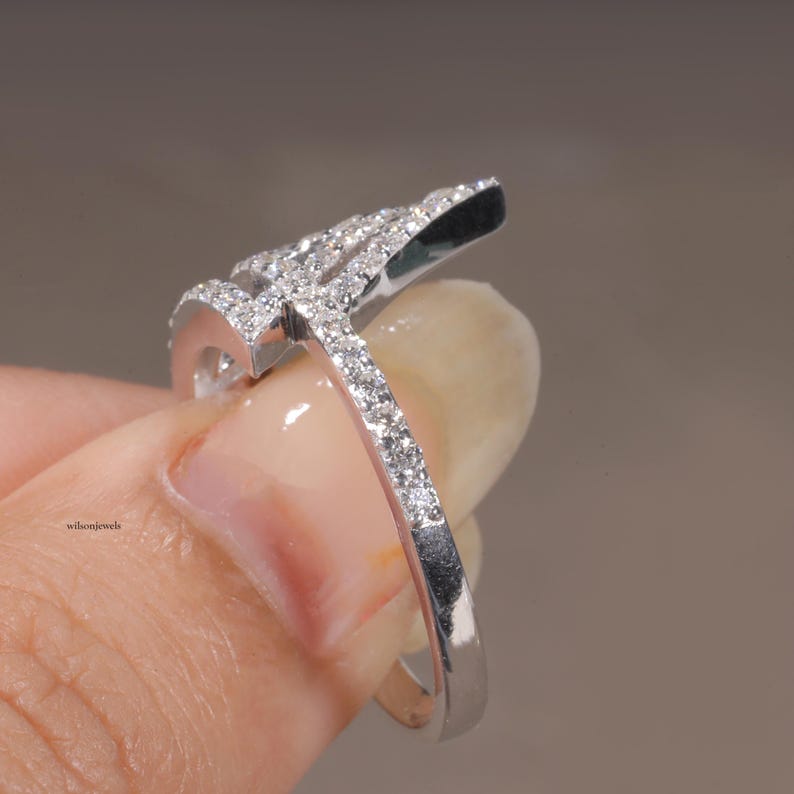 triangle diamond ring
geometric ring
white gold ring
open triangle ring
modern statement ring
minimalist jewelry
pave diamond ring
unique engagement ring
anniversary gift
luxury ring
architectural ring
gift for her
modern bridal ring
triangle ring
geometric jewelry
open design ring
pave diamond ring
white gold jewelry
modern gold ring
statement jewelry
minimalist ring
contemporary ring
architectural ring
unique ring design
fashion ring
gift for women
anniversary jewelry
bridal statement ring