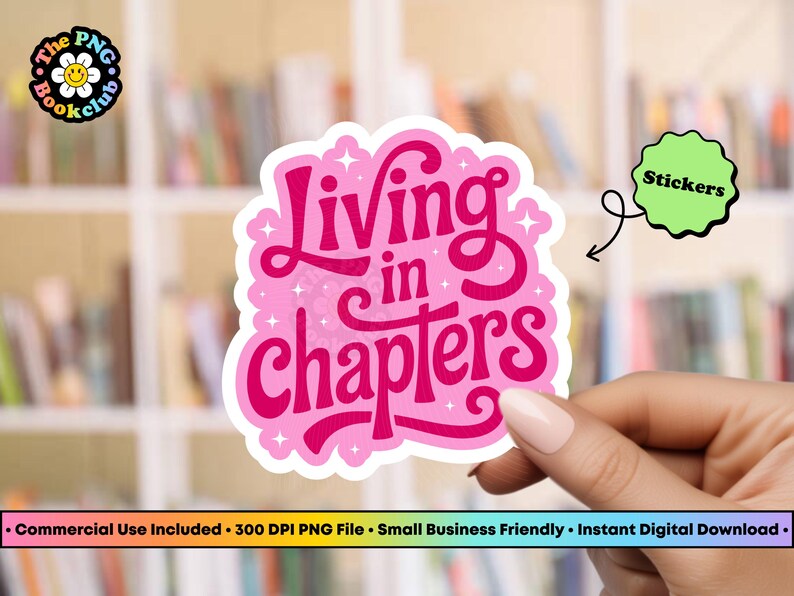 May include: A die-cut sticker featuring the text Living in chapters in a bold, dark pink script font with a light pink outline and small white star accents. The sticker has a wavy, cloud-like border and is presented against a blurred background.