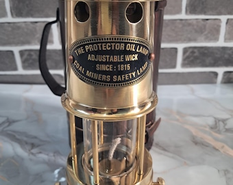 Vintage Style Brass Miner's Safety Lamp: Nautical Industrial Decor with leather case.