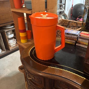 Vintage orange Tupperware pitcher
