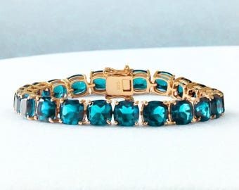 Paraiba Tourmaline Tennis Bracelet: Cushion Cut, 14K Gold over Silver