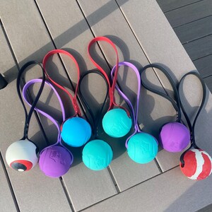Tug toy with bitothane strap and 3&quot; ball