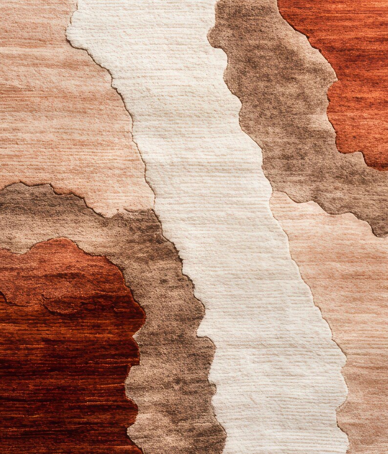 A close-up of the rug showing textured wavy sections in shades of terracotta, brown, and beige.