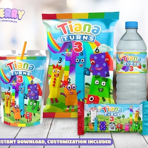 May include: Party printables featuring the text "Tiana Turns 3" with colorful number block characters. Includes a juice pouch with a straw, a snack bag, a water bottle, and a candy bar. The design incorporates a rainbow and the number 3.