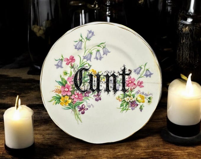 Cunt, vintage plate with stand