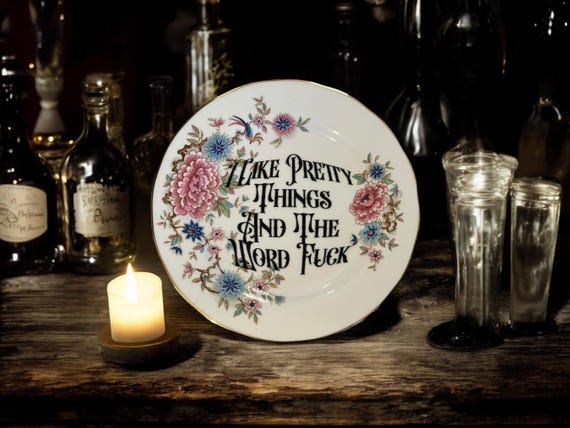 I like pretty things and the word fuck, vintage plate with stand