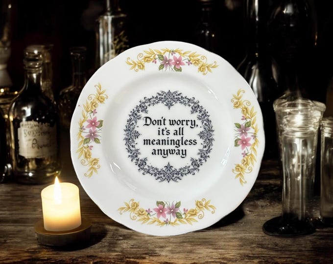 Don't worry it's all meaningless anyway, vintage plate with stand