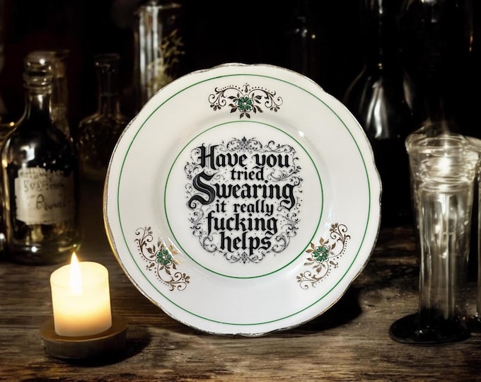 Have you tried swearing it really fucking helps, vintage plate with stand