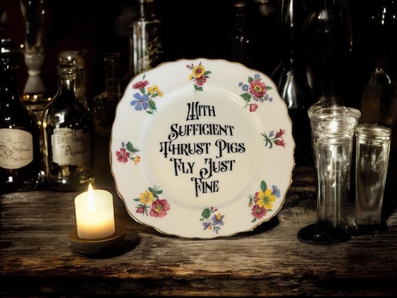 With sufficient thrust pigs fly just fine, vintage plate with stand