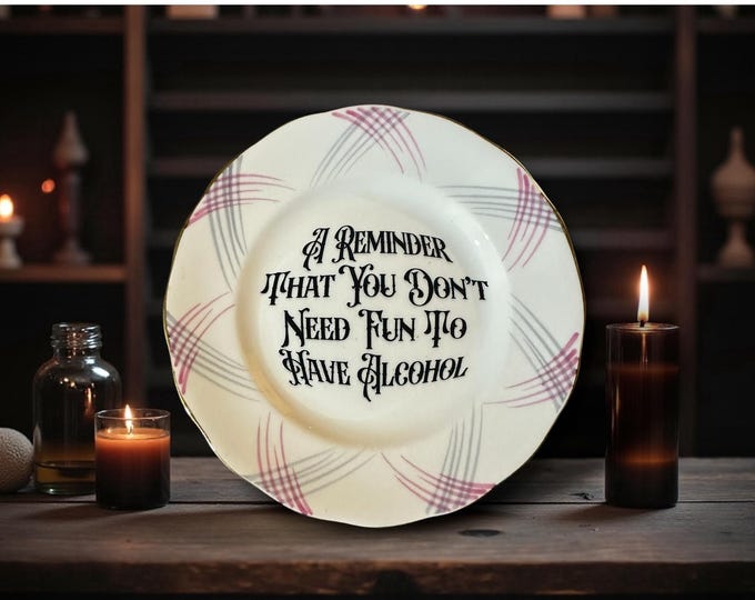 A reminder that you don't need fun to have alcohol, vintage plate with stand