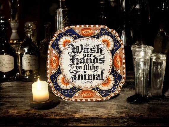 Wash your hands you filthy animal, vintage plate with stand