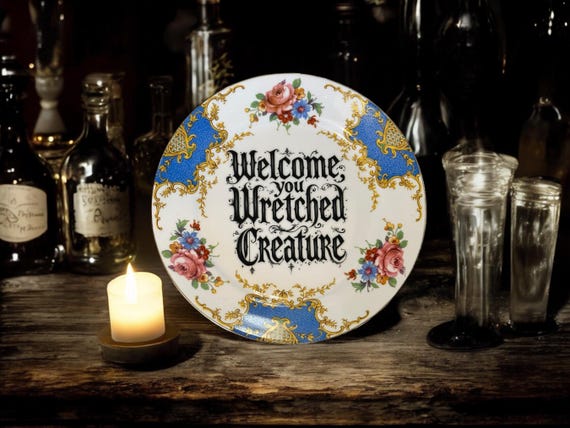 Welcome wretched creature, vintage plate with stand