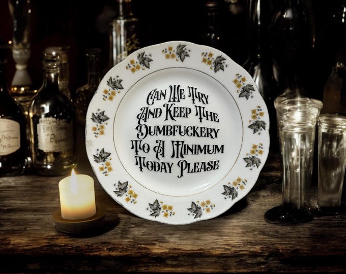 Can we try and keep the dumbfuckery to a minimum today please, vintage plate with stand