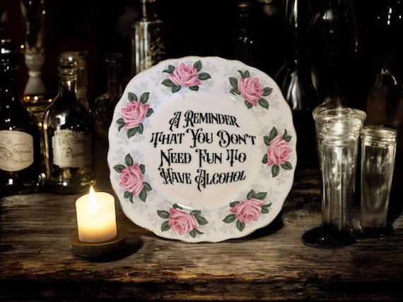 A reminder that you don't need fun to have alcohol, vintage plate with stand
