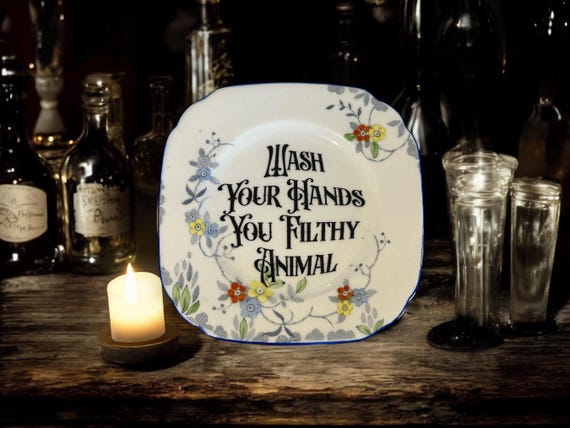 Wash your hands you filthy animal, vintage plate with stand