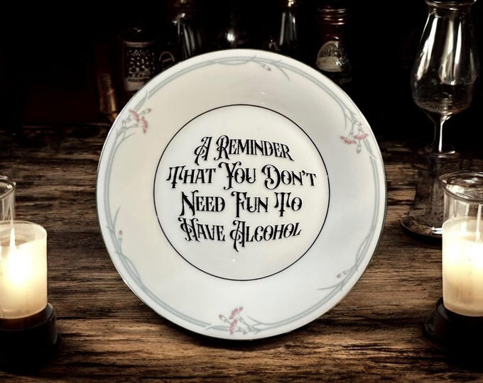A reminder that you don't need fun to have alcohol, vintage plate with stand