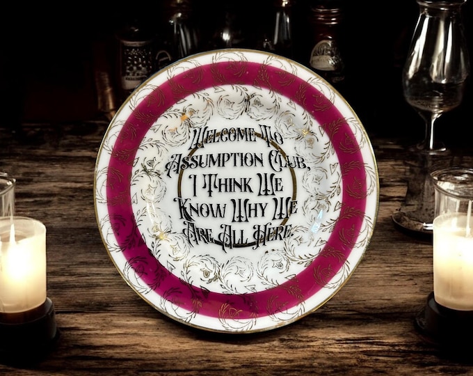 Welcome to assumption club I think we all know why we are here, vintage plate with stand