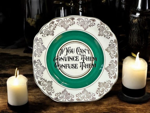 If You Can’t Convince Them, Confuse Them, vintage plate with stand