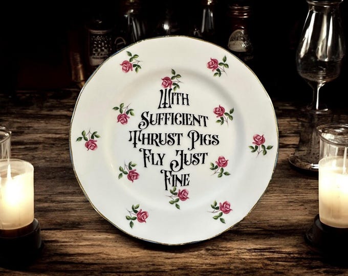 With sufficient thrust pigs fly just fine, vintage plate with stand