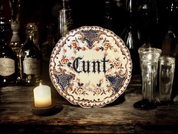 Cunt, vintage plate with stand