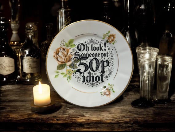 Oh Look, Someone Put 50p in the Idiot Plate – Vintage Crackpottery with stand