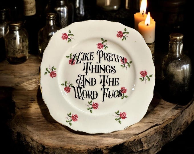 I like pretty things and the word fuck, vintage plate with stand