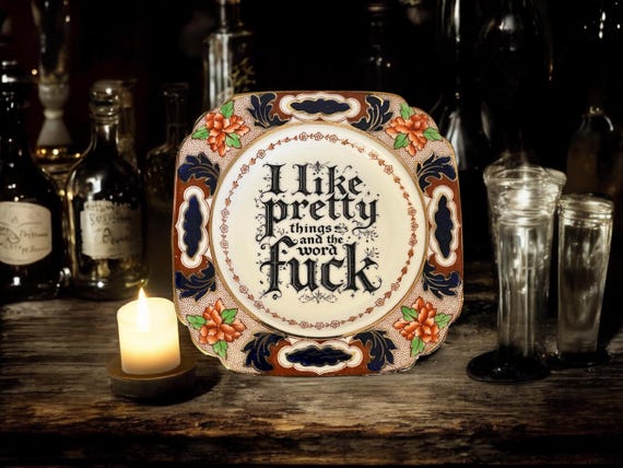 I like pretty things and the word fuck, vintage plate with stand