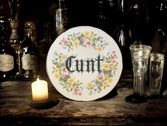 Cunt, vintage plate with stand