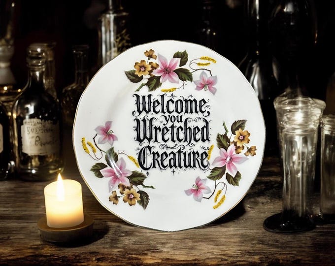 Welcome wretched creature, vintage plate with stand