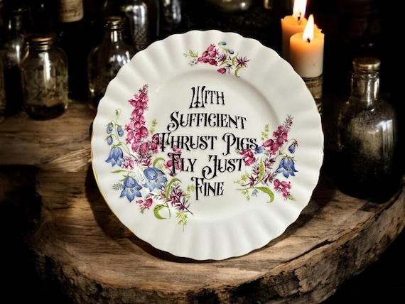 With sufficient thrust pigs fly just fine, vintage plate with stand
