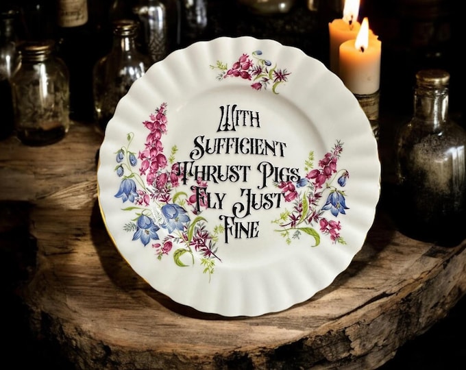 With sufficient thrust pigs fly just fine, vintage plate with stand