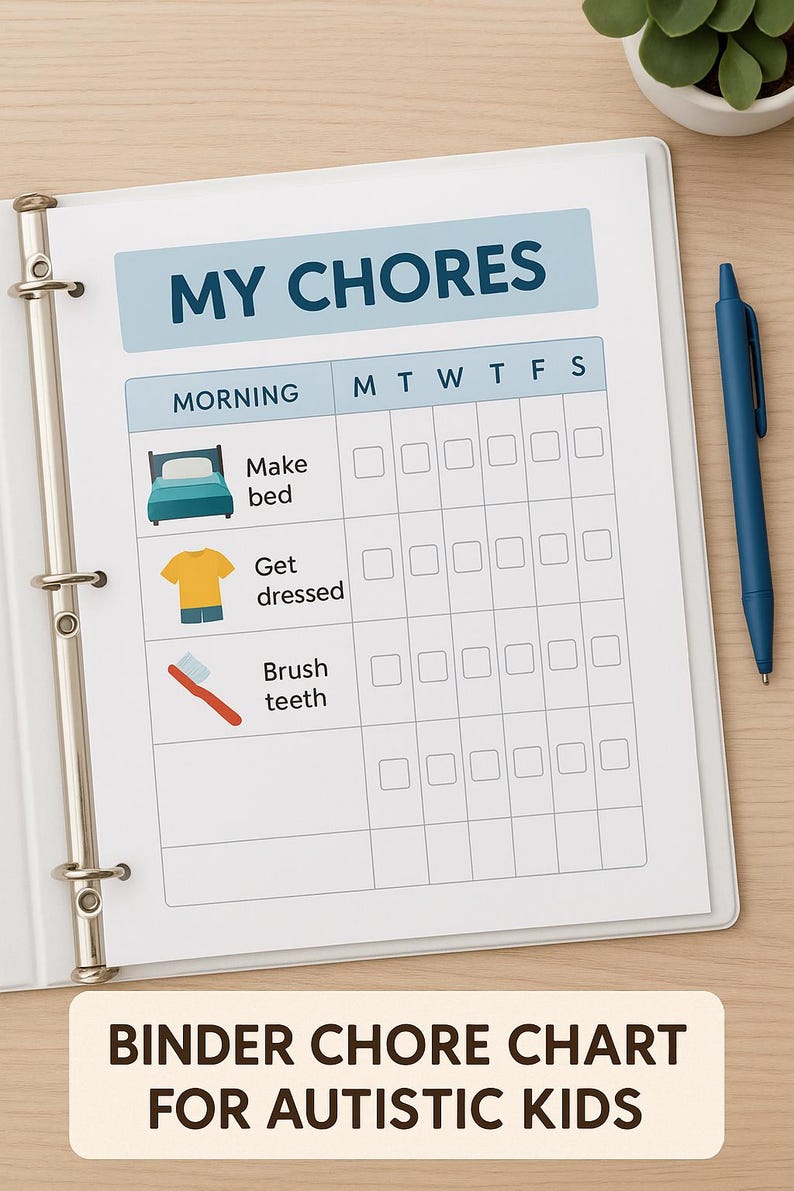 May include: A white binder with a chore chart titled "MY CHORES" for autistic kids. The chart includes illustrations for "Make bed", "Get dressed", and "Brush teeth". A blue pen rests on the wooden surface next to the binder.