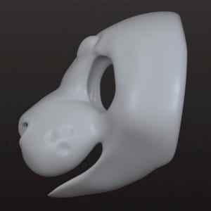 May include: A smooth, matte white animal-inspired mask base featuring a rounded snout, defined brow ridge, large eye openings, and an open mouth area. The mask has a sculpted, three-dimensional shape with a curved profile and a clean, seamless surface.