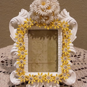 Adorable yellow and white flower embellished frame. A unique frame for your favorite spring or summer picture.