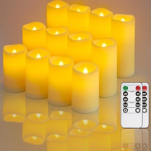 May include: A collection of battery-operated, ivory-colored LED candles with a realistic flickering effect. The candles are arranged in a group, with a remote control for operation. The candles are cylindrical and vary in height.