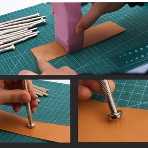 May include: A leather crafting setup with tools and materials. A person is using a pink block to smooth a brown leather strip. Other tools include metal punches and small silver tools. The background is a green cutting mat.