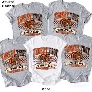 May include: Four short-sleeve t-shirts in athletic heather gray and white. Each shirt features a graphic of a running turkey wearing sunglasses and sneakers, with the text Turkey Trot Family Run 2026 and a checkered pattern background.