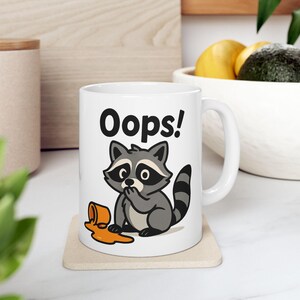 Taza de cerámica con diseño de mapache: divertida taza de café con temática animal para amantes de los animales, regalo para cumpleaños, inauguración de la casa y celebraciones.