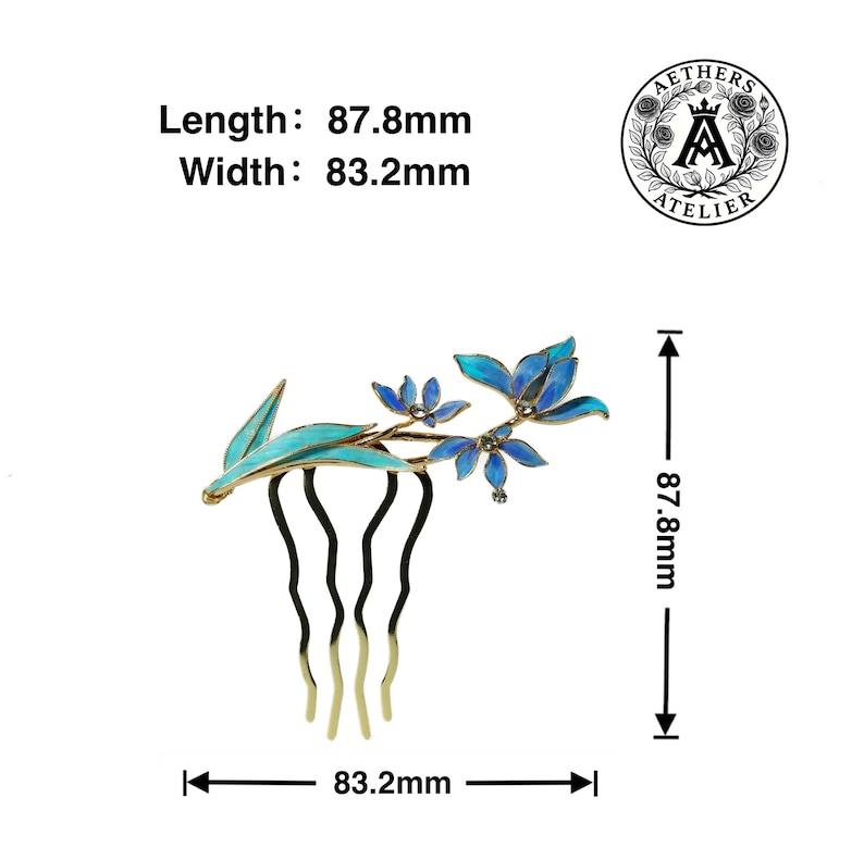 May include: A gold-toned hair comb featuring blue and turquoise enamel floral and leaf accents. The comb measures 87.8mm in length and 83.2mm in width. The Aethers Atelier logo is visible in the top right corner of the image.