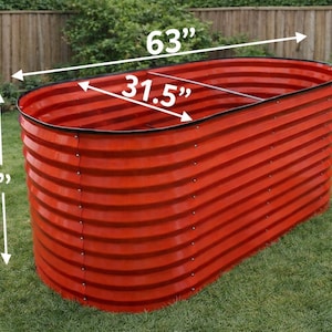 May include: A red corrugated metal raised garden bed. The bed is 63 inches long, 31.5 inches wide, and 30.5 inches tall. The garden bed is on a grassy lawn with a wooden fence in the background.