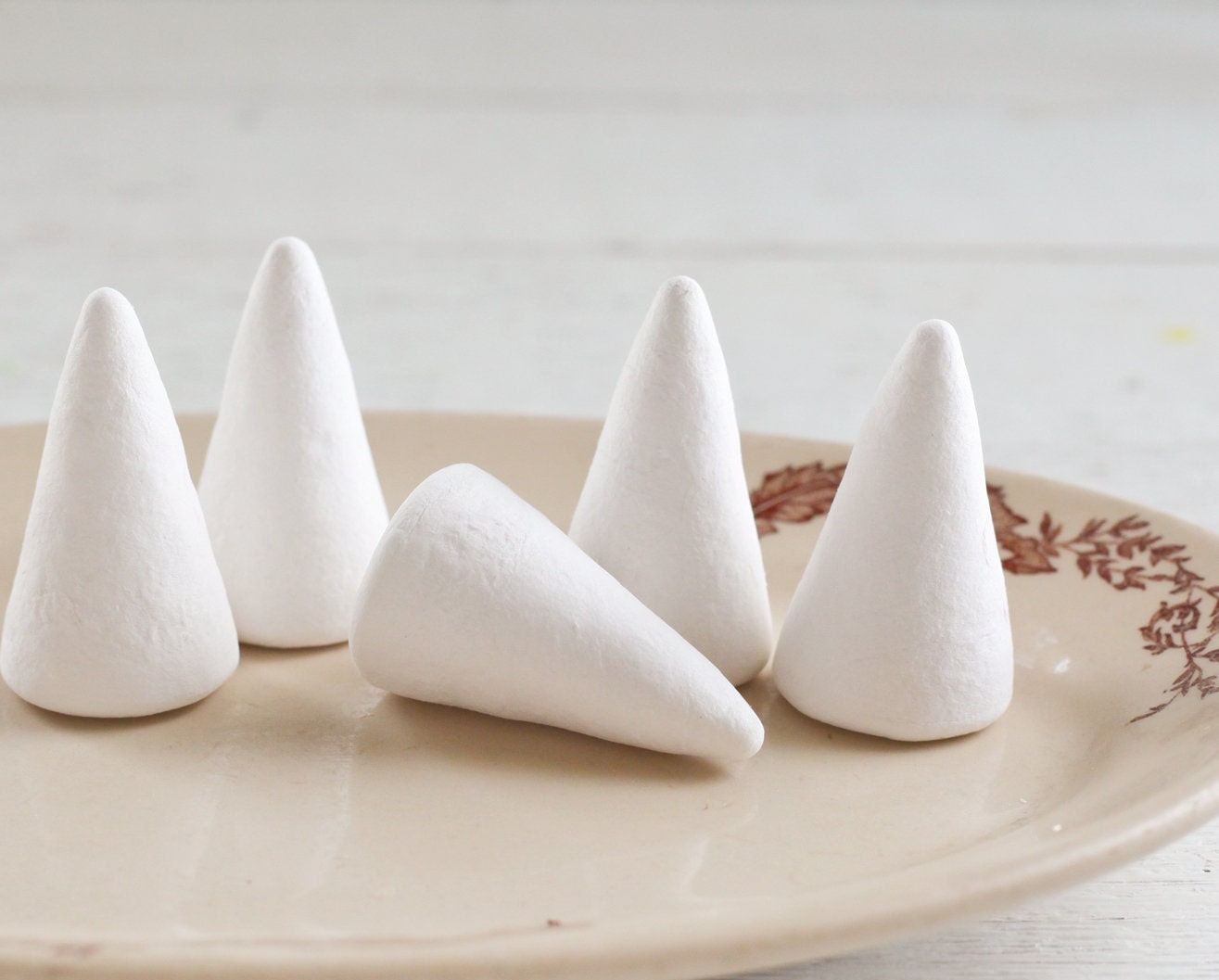 Buy 10 Polystyrene 6.5cm Cones to Decorate