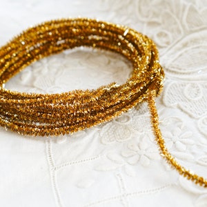 Cordão de enfeites de Natal com arame - Acabamento fino em lurex dourado, 3 jardas.