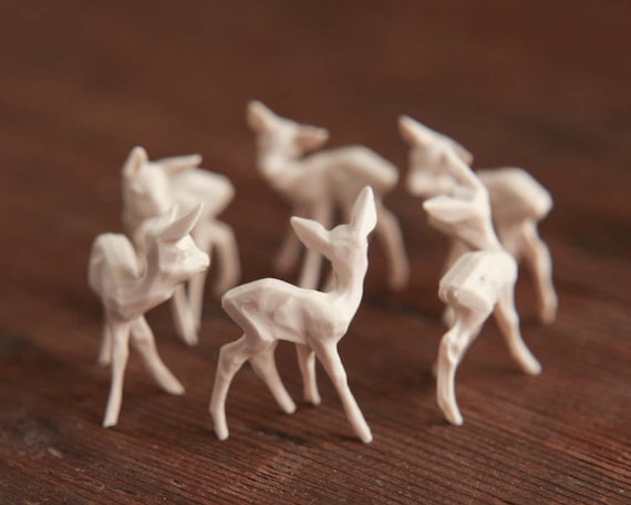small plastic deer figurines