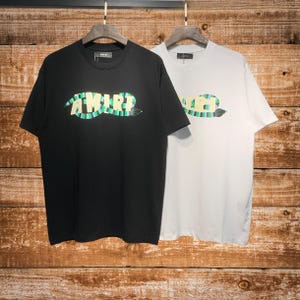 Camiseta Amiri, gola redonda de algodão da moda, manga curta, estampa de letras
