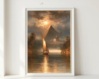 May include: A framed wall art print titled INSPIRED BY CREATE featuring a sailboat on a river at sunset. The scene depicts a pyramid and a sphinx in the background under a cloudy, golden sky, with palm trees lining the riverbanks.
