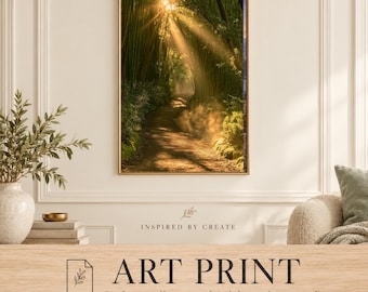 May include: A rectangular wall art print featuring a sunlit forest path with golden light rays filtering through dense green trees. The print is displayed in a thin gold frame. Below the image, the text reads: INSPIRED BY CREATE ART PRINT.
